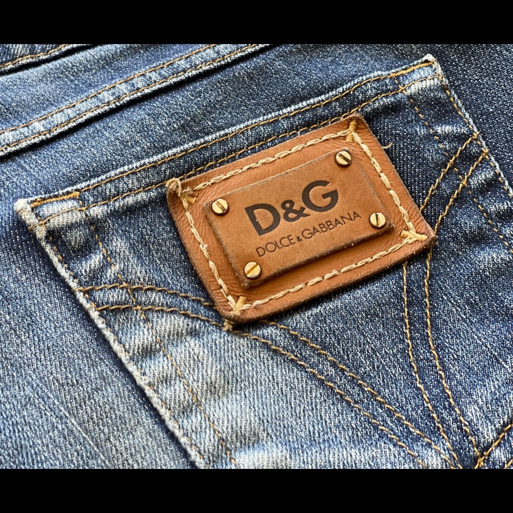 Barely worn 29  Dolce & Gabbana figure hugginf distressed jeans.